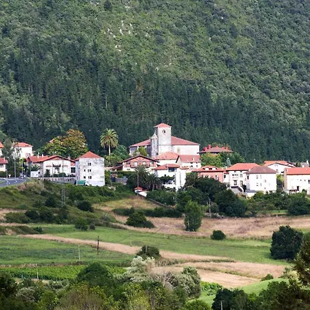 Nyaraló Ojangoiti With Outlet For Electric Vehicle By Kabia Gestion
